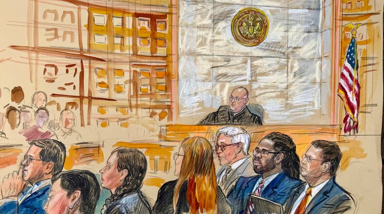 This courtroom sketch depicts Trayon White, Sr., second from right, with defense attorneys Bruce Serby, right, and Warren Kohlman, third from right, before U.S. District Judge Rudolph Contrera, Friday, Sept. 11, 2026, at Federal Court in Washington. (Dana Verkouteren via AP)