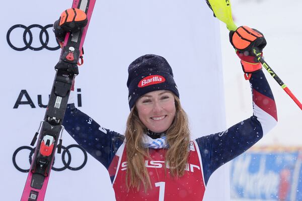 Third placed United States' Mikaela Shiffrin celebrates after an alpine ski, women's World Cup slalom in Are, Sweden, Sunday, March 9, 2025. (AP Photo/Giovanni Auletta)