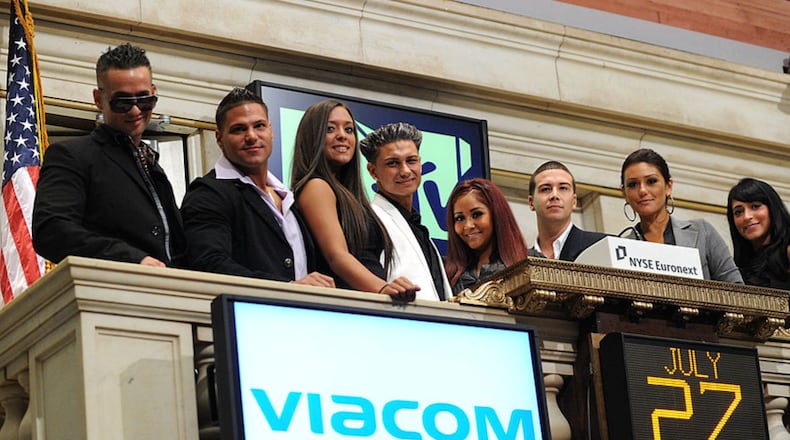 FILE PHOTO: TV personalities Michael 'The Situation' Sorrentino, Ronnie Ortiz-Magro, Sammi 'Sweetheart' Giancola, Paul "Pauly D" DelVecchio, Nicole 'Snooki' Polizzi, Vinny Guadagnino, Jenni 'J-WOW' Farley and Angelina 'Jolie' Pivarnick ring the opening bell at the New York Stock Exchange on July 27, 2010 in New York City.  (Photo by Jason Kempin/Getty Images)