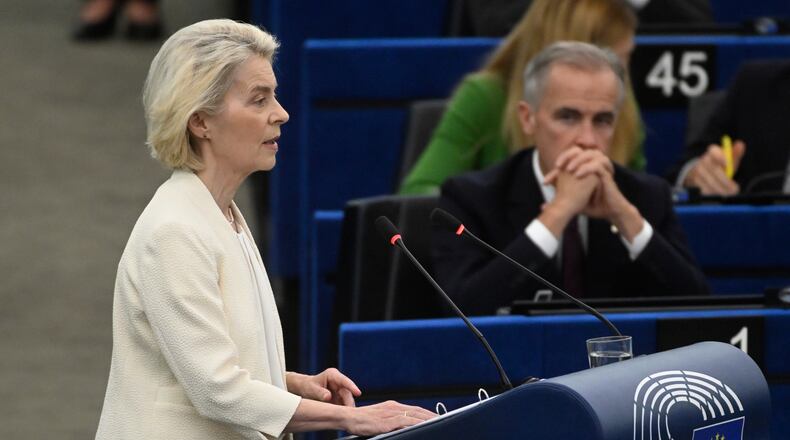 Canada's Prime Minister Mark Carney, right, listens to European Commission President Ursula von der Leyen, during the annual State of the European Union at the European Parliament in Strasbourg, eastern France, Wednesday, Sept 16, 2026. (AP Photo/Pascal Bastien)