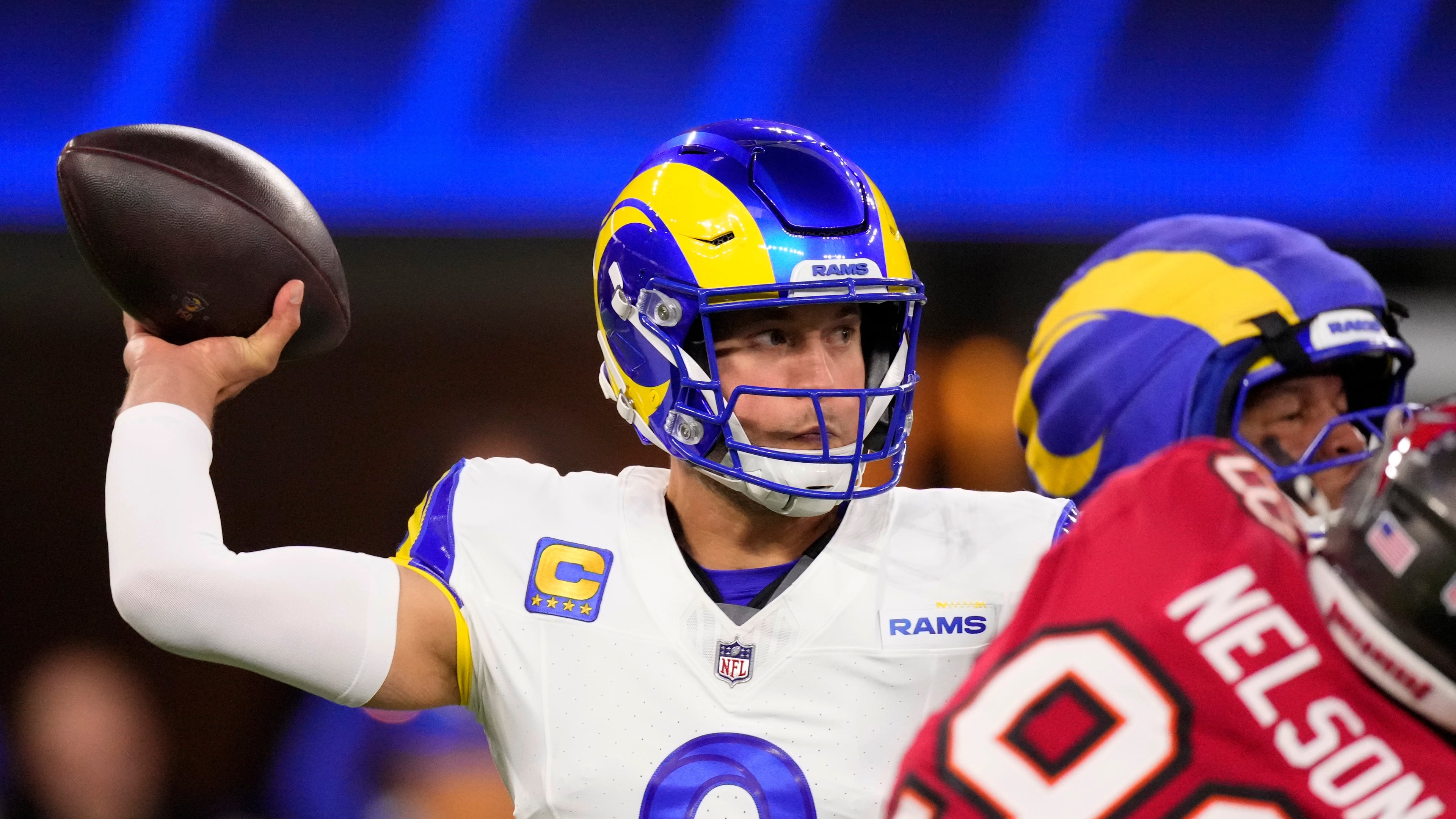 Los Angeles Rams quarterback Matthew Stafford (9) passes against the Tampa Bay Buccaneers during the first half of an NFL football game, Sunday, Nov. 23, 2025, in Inglewood, Calif. (AP Photo/Mark J. Terrill)