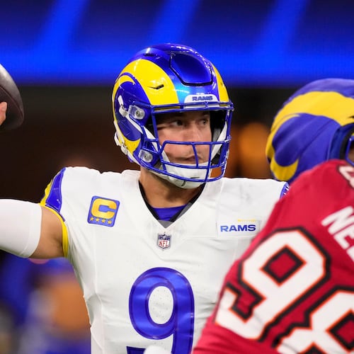 Los Angeles Rams quarterback Matthew Stafford (9) passes against the Tampa Bay Buccaneers during the first half of an NFL football game, Sunday, Nov. 23, 2025, in Inglewood, Calif. (AP Photo/Mark J. Terrill)