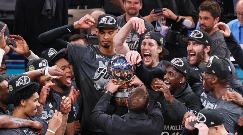 The San Antonio Spurs celebrate after defeating the Oklahoma City Thunder in the Western Conference finals of the NBA basketball playoffs series Saturday, May 30, 2026, in Oklahoma City. (AP Photo/Nate Billings)