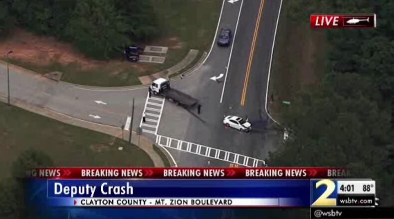 A Clayton County deputy was injured Thursday in a head-on crash near Jackson Elementary School. (Credit: Channel 2 Action News)