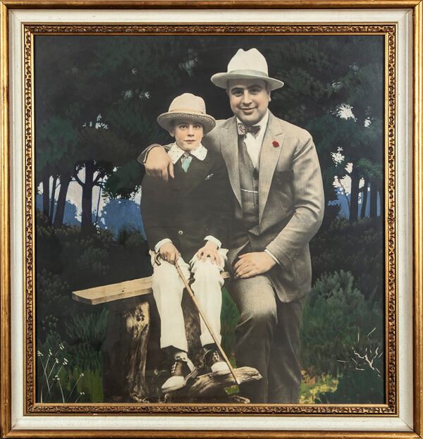 A hand-painted print of a photo of Al Capone and his son, Sonny Capone, from an undated photo, is up for auction with the rest of Capone's estate. (Witherell's/Chicago Tribune/TNS)