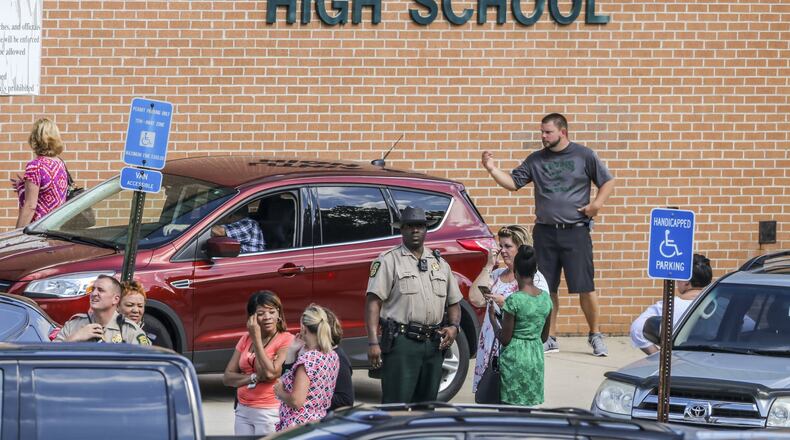 Early Aug. 17, a veteran Lithia Springs High School teacher walked to his classroom, pulled out a handgun and shot himself, the Douglas County Sheriff’s Office said. He is in stable condition and authorities have not yet decided whether to charge him criminally. JOHN SPINK/JSPINK@AJC.COM