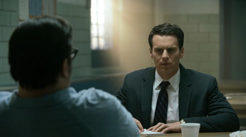 The fictional Netflix show "Mindhunter" follows two FBI agents in the early days of their research into serial killers, interviewing them to find patterns to deter future crimes. The show premiered in October 2017.
