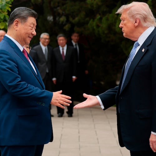 FILE - U.S. President Donald Trump, right, shakes hands with Chinese President Xi Jinping while leaving after a visit to the Zhongnanhai Garden in Beijing, Friday, May 15, 2026. (Evan Vucci/Pool Photo via AP, file)