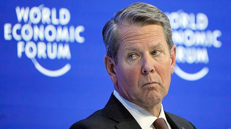 Gov. Brian Kemp will return to Davos, Switzerland, this year for the World Economic Forum after making a splash last year as one of the few conservative voices in an atmosphere dominated by an annual gathering of billionaire financiers, corporate executives and global heads of state. “We got great value out of the visit last year. We got tons of earned media, and we did probably a year’s worth of meetings that saved us a lot of international travel,” Kemp said Monday. “We sold the state to all these companies and businesses over there.” (Markus Schreiber/Associated Press)