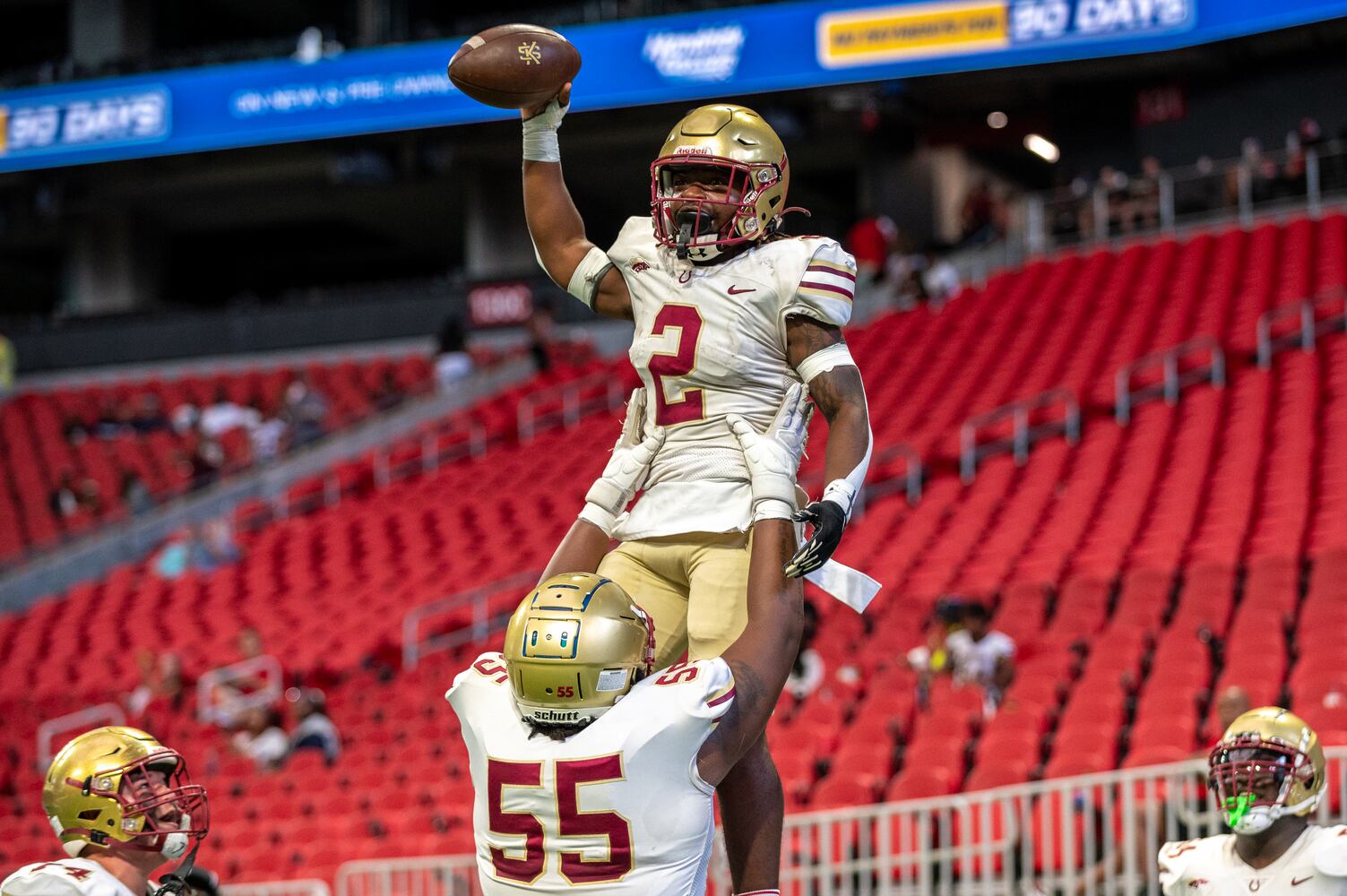 Brookwood running back Cameron French celebrates a touchdown at Mercedes Benz Stadium on August 19, 2023. (Jamie Spaar for the Atlanta Journal Constitution)