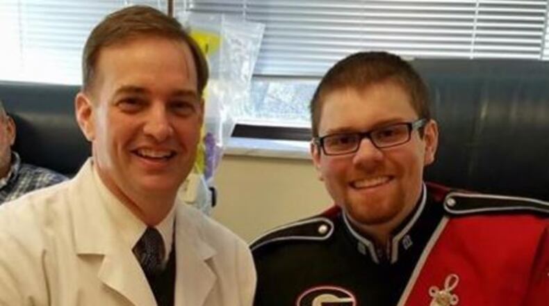 Hunter Moreland, right, and Dr. Davey Daniel. (Credit: Facebook/The University of Georgia Bands)
