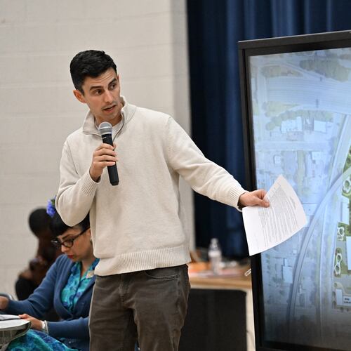 Andrew Alves, Digital Realty’s senior vice president of acquisitions, speaks during a town hall by NPU-V and Digital Realty to discuss a planned data center in Atlanta at Dunbar Elementary School, Thursday, March 19, 2026, in Atlanta. (Hyosub Shin/AJC)