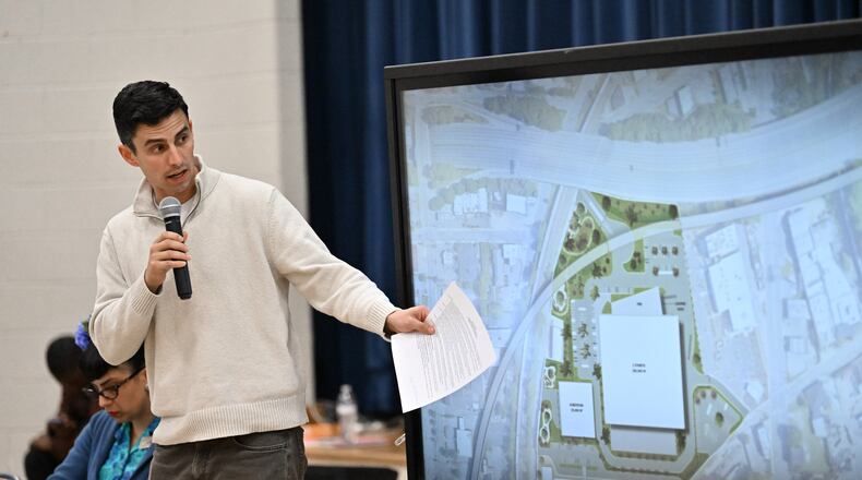 Andrew Alves, Digital Realty’s senior vice president of acquisitions, speaks during a town hall by NPU-V and Digital Realty to discuss a planned data center in Atlanta at Dunbar Elementary School, Thursday, March 19, 2026, in Atlanta. (Hyosub Shin/AJC)