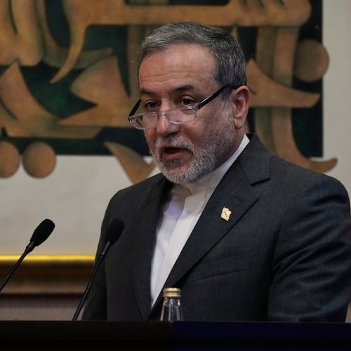 Iranian Foreign Minister Abbas Araghchi addresses a conference titled "International Law Under Assault: Aggression and Self-Defense," in Tehran, Iran, Sunday, Nov. 16, 2025. (AP Photo/Vahid Salemi)