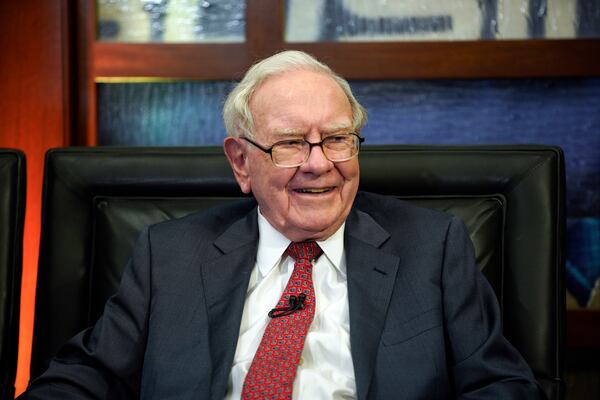 FILE - Berkshire Hathaway Chairman and CEO Warren Buffett smiles during an interview in Omaha, Neb., May 7, 2018, with Liz Claman on Fox Business Network's "Countdown to the Closing Bell". (AP Photo/Nati Harnik, File)