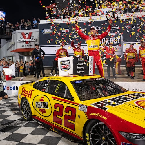 Team Penske driver Joey Logano (22) celebrates in victory lane after winning the Cook Out 400 at Richmond Raceway, Saturday, Aug. 15, 2026, in Richmond Va. (AP Photo/Robert Simmons)