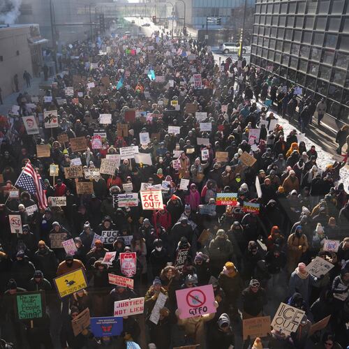 EDS NOTE: OBSCENITY - People protest against ICE (Immigration and Customs Enforcement) in downtown Minneapolis, Sunday, Jan. 25, 2026. (AP Photo/Adam Gray)