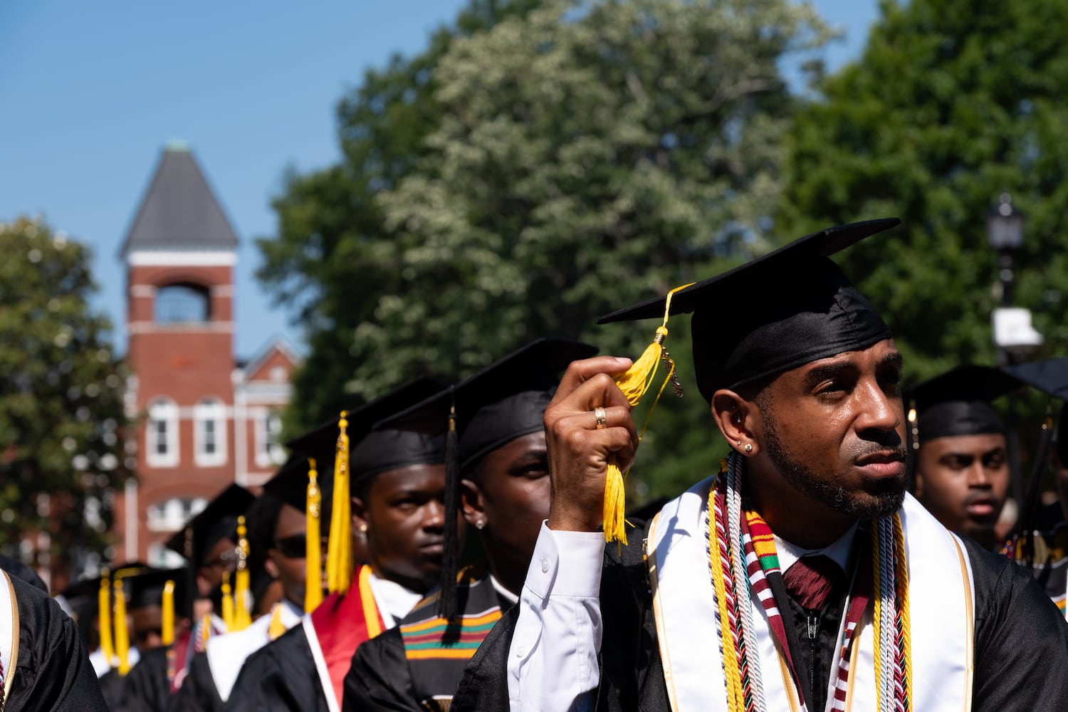 Co-salutatorian O’Rell Roberts adjusts his tassel
during the Morehouse College graduation Sunday, May 17, 2026. (Ben Gray for the AJC)