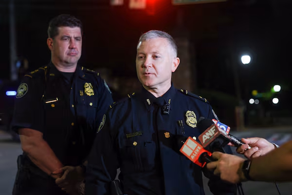 Atlanta police Lt. Christopher Butler speaks to reporters near Piedmont Park just after midnight on Sunday, April 5, 2026. A shooting hours earlier on Saturday left one teen dead and injured another. (Arvin Temkar / AJC)