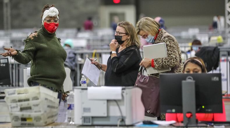 January 6, 2021 Atlanta: Election count observers are toured through the work area as Fulton County resumed counting ballots at 9:30 a.m. on Wednesday, Jan. 6, 2021 an hour later than election officials had planned. Fulton elections director Richard Barron told county commissioners Wednesday morning there are 7,500 absentee ballots left to be uploaded. Fulton spokeswoman Jessica Corbitt said there are 2,700 left to be processed at Georgia World Congress Center. Mail-in ballots take more time to count because they are more complicated to tabulate. There are a variety of reasons, including an adjudication process that allows ballots with stray markings or other irregularities to be reviewed by poll watchers from each party. The adjudication process for those remaining ballots will begin today at 3 p.m. That means Fulton’s ballots won’t be uploaded until after 3 p.m., Barron said. The process will occur at the county’s English Street warehouse, which is where votes are actually uploaded once they’ve been adjudicated. “We have been unfairly, and I’ll state that unequivocally, unfairly criticized by any number of people,” Fulton Commission Chairman Robb Pitts said during a virtual press conference, “no justification whatsoever.” State election officials said voting generally went smoothly Tuesday, with short lines and average wait times of about 1 minute. (John Spink / John.Spink@ajc.com)