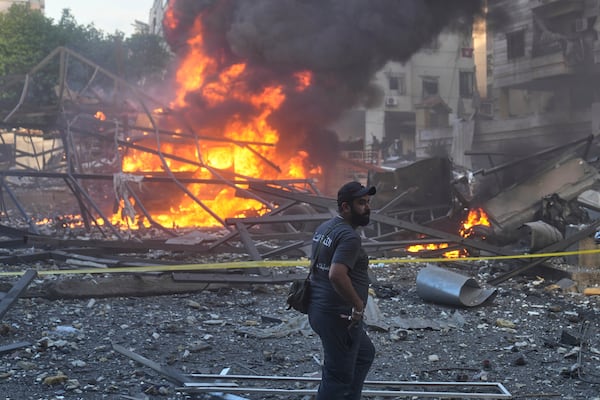 Flames burn after an Israeli airstrike on Dahiyeh in the southern suburb of Beirut, Lebanon, Sunday, April 27, 2025. (AP Photo/Hussein Malla)