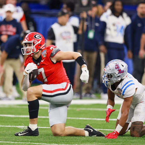Georgia tight end Lawson Luckie (left) — pictured during the College Football Playoff game against Ole Miss in January — is one of seven Bulldogs who will have an extra year to play in college, should they so choose, under the new "5-in-5." (Jason Getz/AJC 2026)