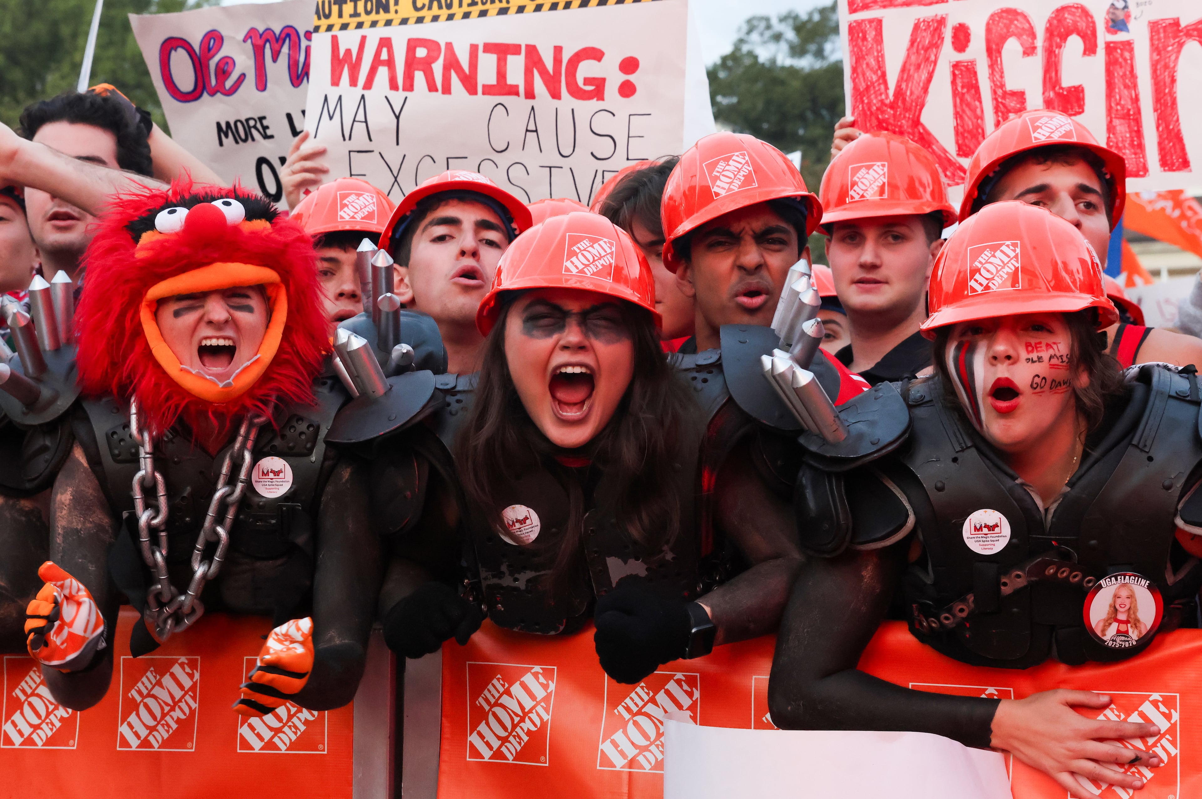 UGA fans pose for photos before the ESPN College GameDay broadcast from Myers Quad at UGA on Saturday, Oct. 18, 2025. (C.J. Bartunek for the AJC)
