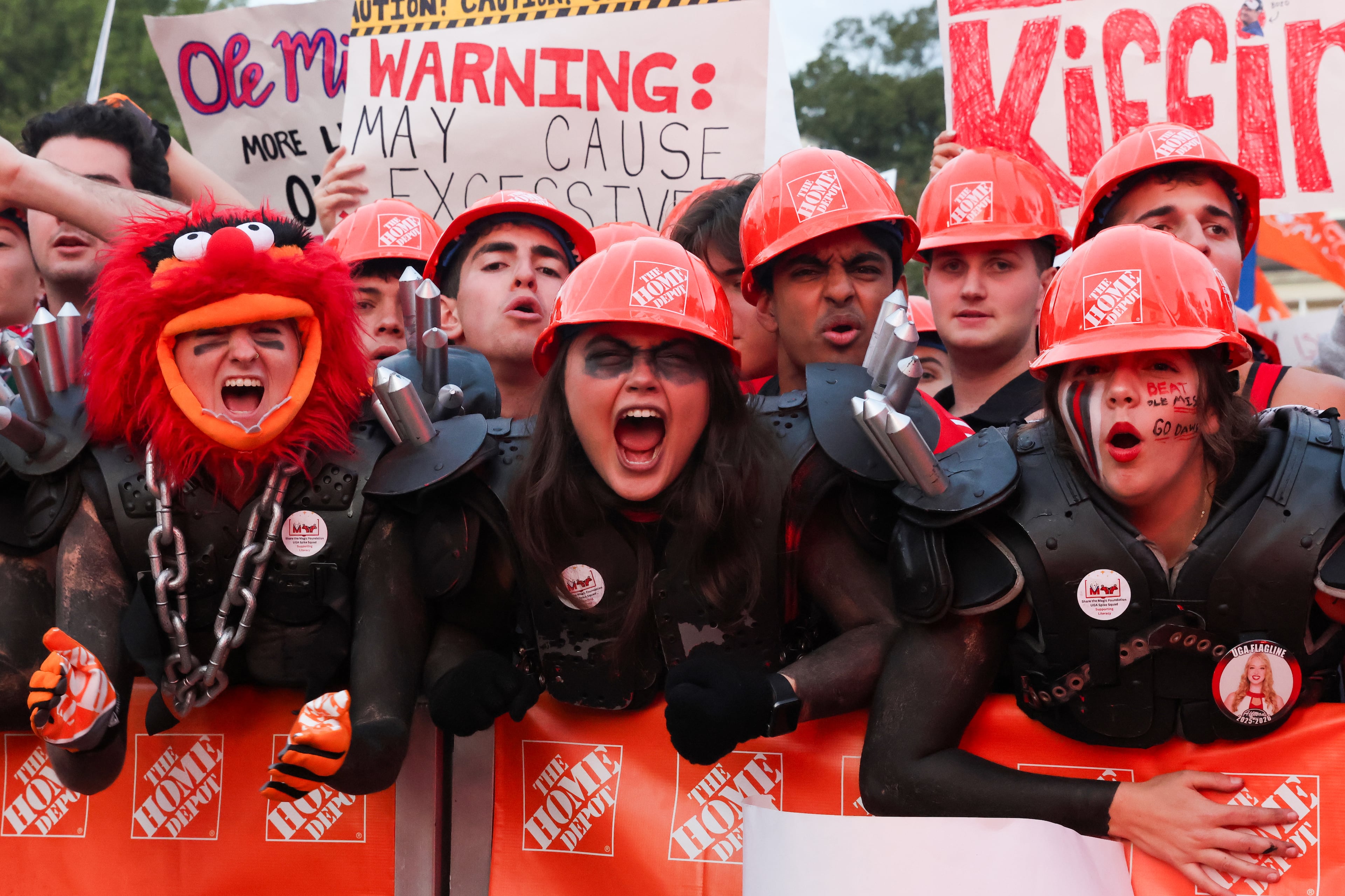 UGA fans pose for photos before the ESPN College GameDay broadcast from Myers Quad at UGA on Saturday, Oct. 18, 2025. (C.J. Bartunek for the AJC)