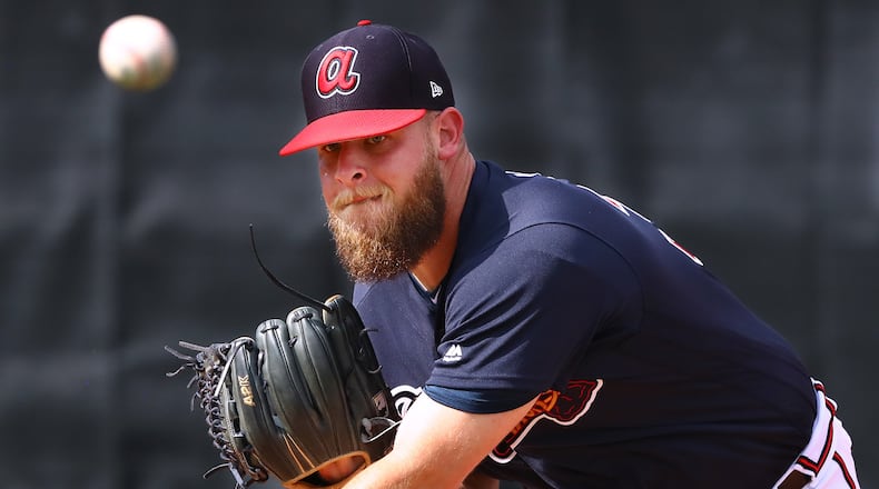 Feb. 19, 2019 Lake Buena Vista: Atlanta Braves pitcher A.J. Minter throws in the bullpen during spring training at the ESPN Wide World of Sports Complex on Tuesday, Feb. 19, 2019, in Lake Buena Vista. Curtis Compton/ccompton@ajc.com