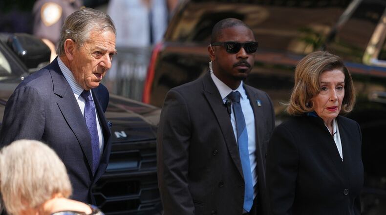 Rep. Nancy Pelosi, D-Calif., and her husband Paul arrive at the funeral services for Clive Davis at Central Synagogue in New York, Monday, June 29, 2026. (AP Photo/Adam Gray)