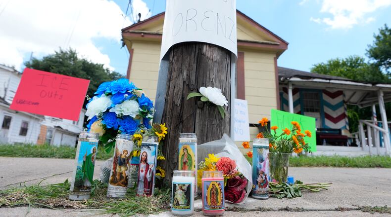 A makeshift memorial for Lorenzo Salgado Araujo, who was shot and killed by an ICE officer Tuesday, is shown Wednesday, July 8, 2026, in Houston. (AP Photo/David J. Phillip)