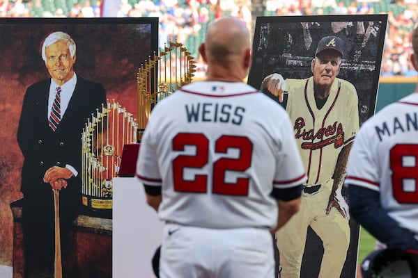 Braves manager Walt Weiss stands during a tribute to the team’s late iconic owner Ted Turner (left) and legendary manager Bobby Cox on Tuesday, May 12, 2026, at Truist Park in Atlanta. (Arvin Temkar/AJC)