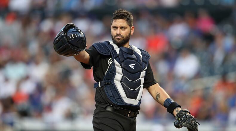 New Braves catcher Francisco Cervelli gestures toward the dugout. (AP Photo/Mary Altaffer)