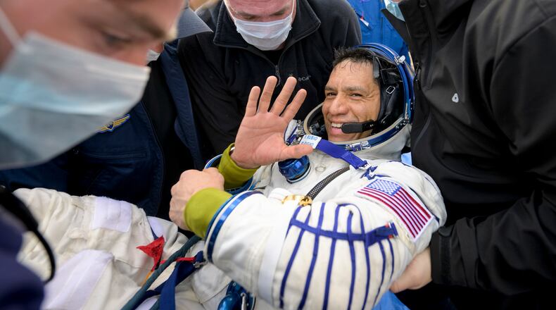 Frank Rubio, a NASA astronaut, is helped out of the Soyuz MS-23 spacecraft minutes after he and Roscosmos cosmonauts landed near Dzhezkazgan, Kazakhstan, on Wednesday, Sept. 27, 2023. Rubio safely returned to Earth after spending 371 days in space, a record in spaceflight for American astronauts. He will return to orbit next year aboard the Orion spacecraft. (Bill Ingalls/NASA via The New York Times)