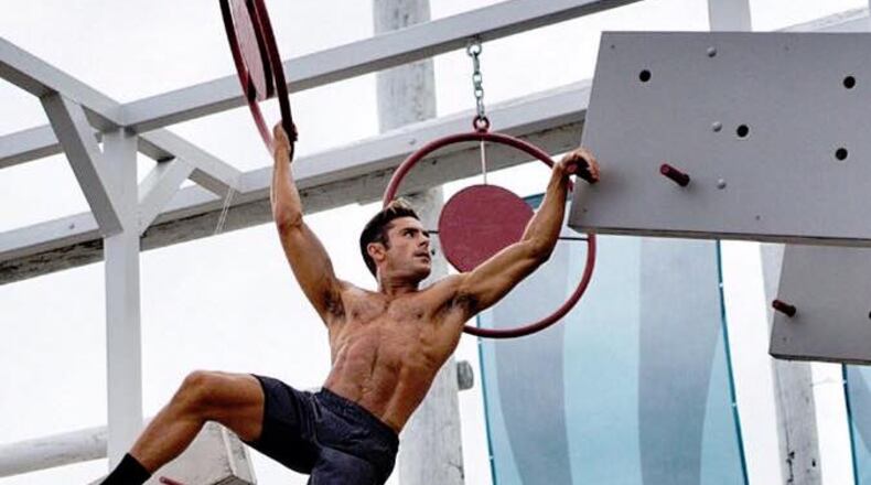 Zac Efron posted this photo of himself just hanging out looking all perfect.