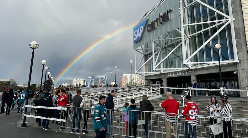 FILE - A rainbow is shown as fans line up outside SAP Center at San Jose before an NHL hockey game between the Chicago Blackhawks and the San Jose Sharks in San Jose, Calif., March 23, 2024. (AP Photo/Jeff Chiu, File)