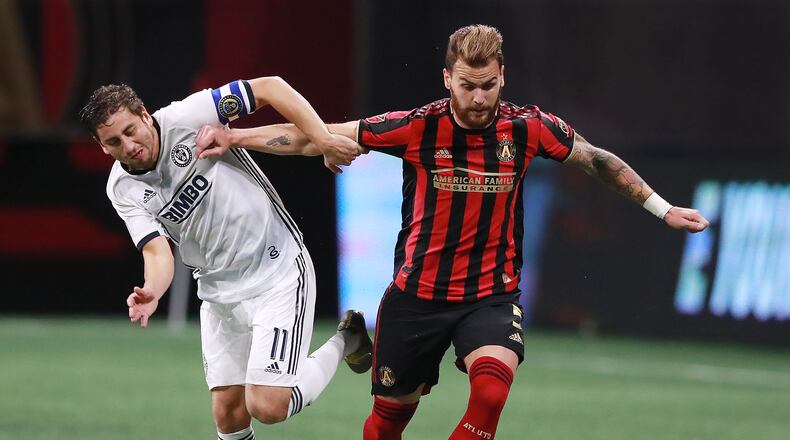 March 17, 2019 Atlanta: Atlanta United defender Leandro Gonzalez Pirez battles Philadelphia Union midfielder Alejandro Bedoya for the ball during the first half in a MLS soccer match on Sunday, March 17, 2019, in Atlanta. Curtis Compton/ccompton@ajc.com