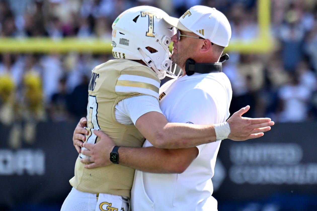 Georgia Tech quarterback Haynes King (left) celebrates with Georgia Tech head coach Brent Key after scoring a touchdown during the second half in an NCAA college football game at Bobby Dodd Stadium, Saturday, Oct. 25, 2025 in Atlanta. Georgia Tech won 41-16 over Syracuse. The Yellow Jackets are 8-0 for the first time since 1966 and 5-0 in the ACC for the first time ever. (Hyosub Shin/AJC)