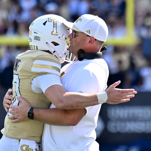 Georgia Tech quarterback Haynes King (10) celebrates with Georgia Tech head coach Brent Key after scoring a touchdown during the second half in an NCAA college football game at Bobby Dodd Stadium, Saturday, October 25, 2025 in Atlanta. Georgia Tech won 41-16 over Syracuse. The Yellow Jackets are 8-0 for the first time since 1966 and 5-0 in the ACC for the first time ever. (Hyosub Shin / AJC)