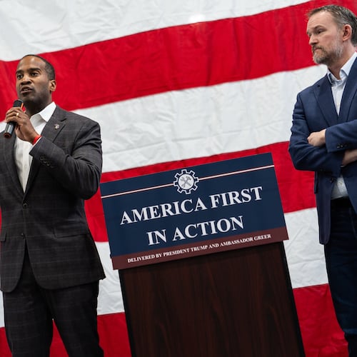 U.S. Trade Representative Jamieson Greer, right, listens to Rep. John James, R-Mich., left, speak during a tour of Atomic Industries' manufacturing facility, Thursday, April 9, 2026, in Warren, Mich. (AP Photo/Julia Demaree Nikhinson)