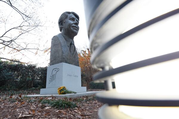 A bouquet is seen at the bust of Jimmy Carter outside of the Carter Center on Sunday, November 19, 2023, after the death of Rosalynn Carter, the wife of former president Jimmy Carter.
Miguel Martinez /miguel.martinezjimenez@ajc.com