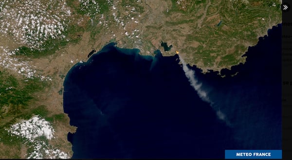 This satellite photo, provided by Meteo-France, shows smoke billowing due to wildfires near Marseille, southern France, Tuesday, July 8, 2025. (Meteo-France /NOAA via AP)