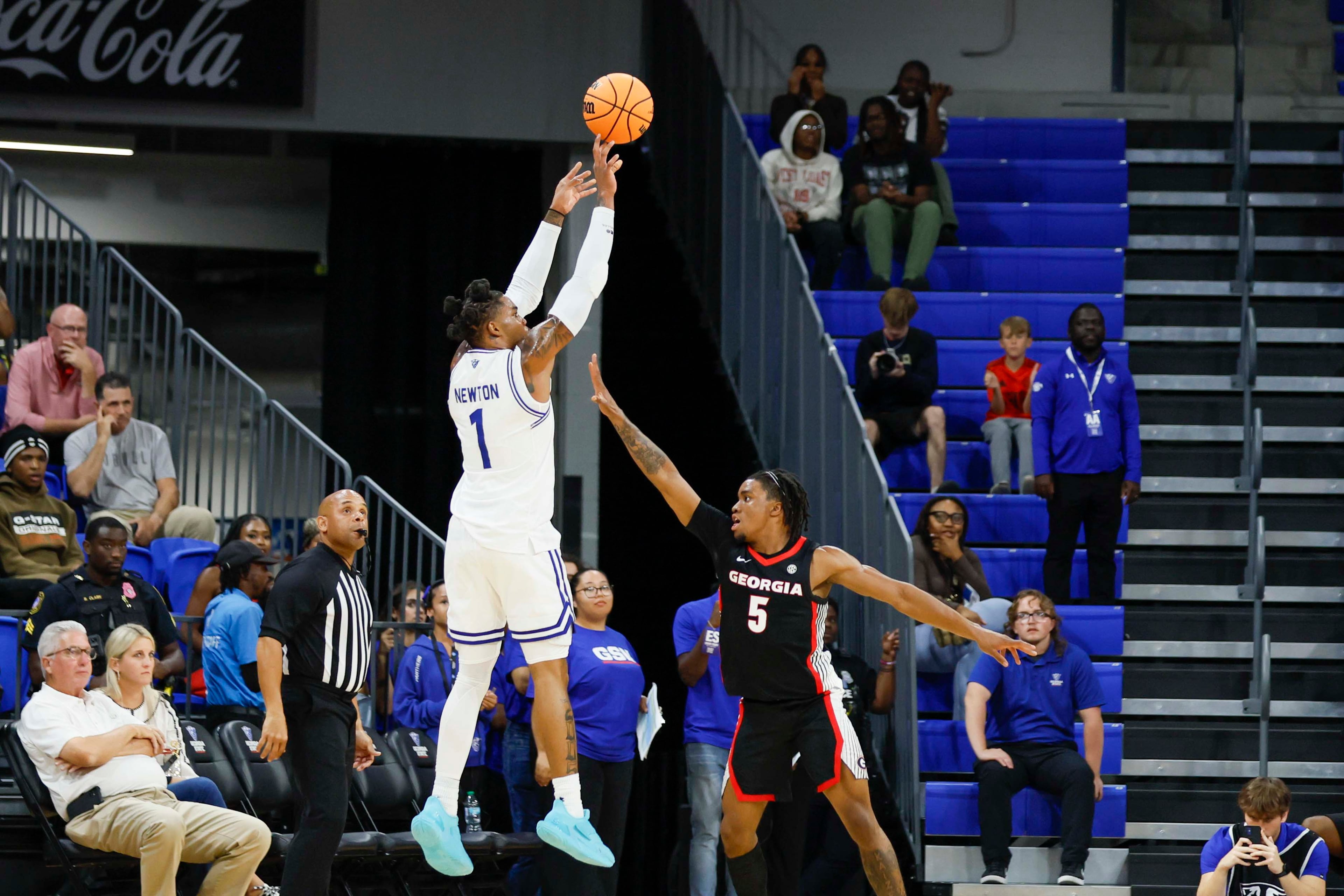 Georgia State Panthers guard Jakai Newton (1) attempts a shot against Georgia Bulldogs guard Jeremiah Wilkinson (5) during the first half of an exhibition game at the Georgia State Convocation Center on Wednesday, October 15, 2025, in Atlanta.
(Miguel Martinez/ AJC)