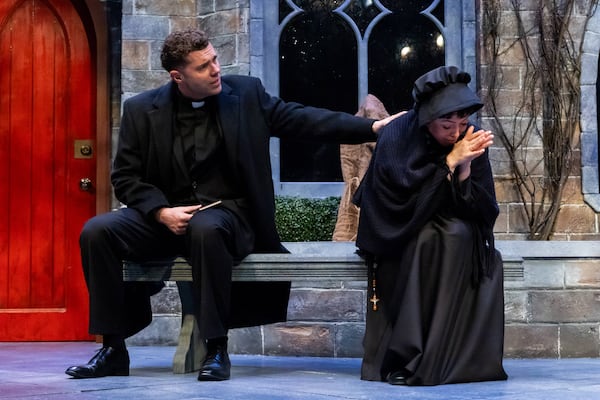 Father Flynn (Justin Walker), whose actions with a student raise questions, shares a scene with Sister James (Sarah Velasco) in "Doubt: A Parable." (Courtesy of Casey Gardner Ford)