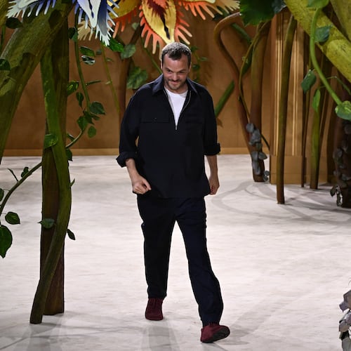 Designer Matthieu Blazy accepts applause after the Chanel Haute Couture Fall/Winter 2026-2027 Women's collection presented in Paris, Tuesday, July 7, 2026. (AP Photo/Emma Da Silva)