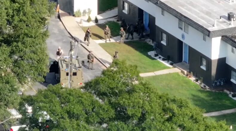 A man was arrested Friday, four months after a deadly shooting and SWAT standoff in southwest Atlanta, police said.