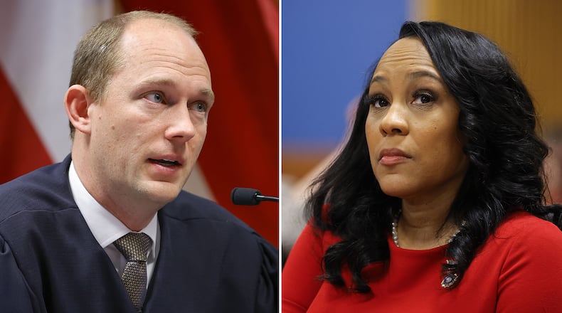 Fulton County Superior Judge Scott McAfee allowed District Attorney Fani Willis to remain on the Georgia election interference case against former President Donald Trump, but he also is allowing the defense to challenge the ruling to the state Court of Appeals. (Alex Slitz/AP)