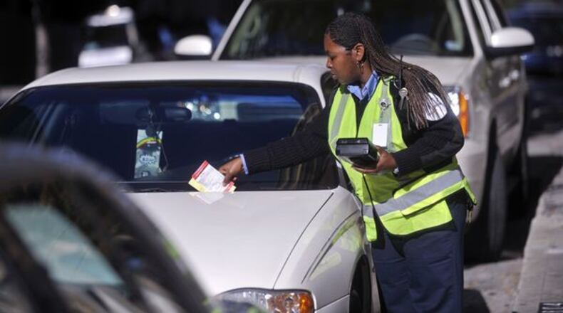 Lawrenceville will ban street parking 10 p.m. to 6 a.m. AJC File Photo