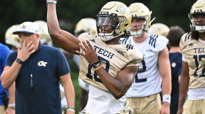 Georgia Tech quarterback Jeff Sims throws a ball during the first football practice of the season Friday at Alexander Rose Bowl Field. (Hyosub Shin / Hyosub.Shin@ajc.com)