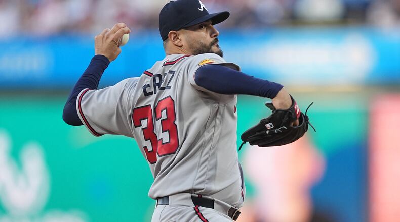 Atlanta Braves' Martin Perez pitches during the first inning of a baseball game against the Philadelphia Phillies, Friday, April 17, 2026, in Philadelphia. (AP Photo/Matt Rourke)